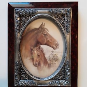 Photo frame colored brown with slated grey chrome.  9.3/4 x 7 in. approximate.